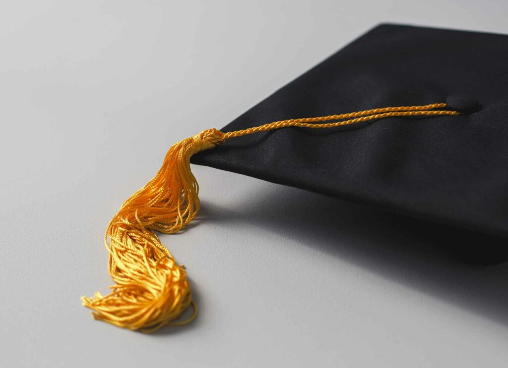 graduation cap with golden tassle